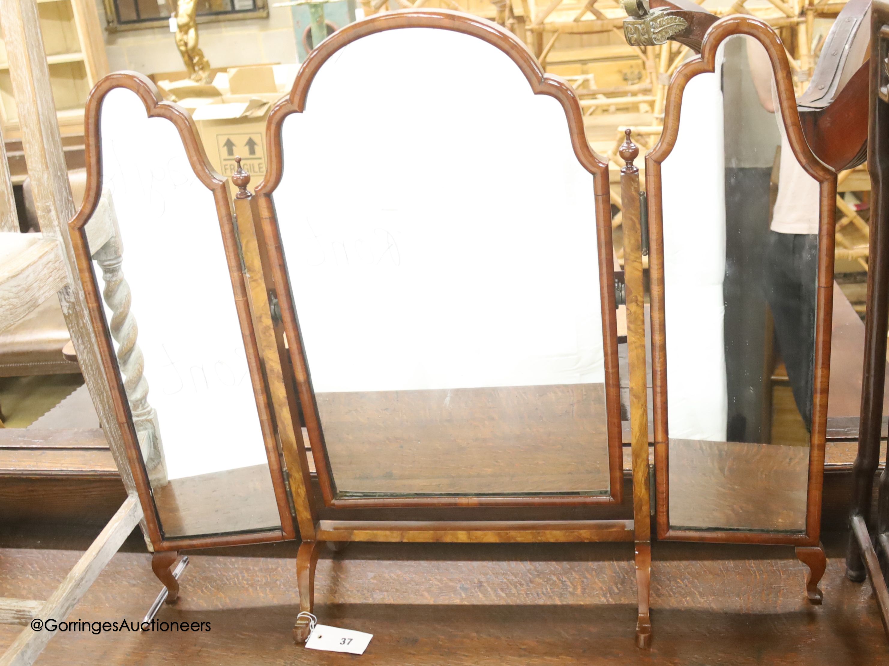 An early 20th century walnut triple folding dressing table mirror, width 78cm, height 67cm